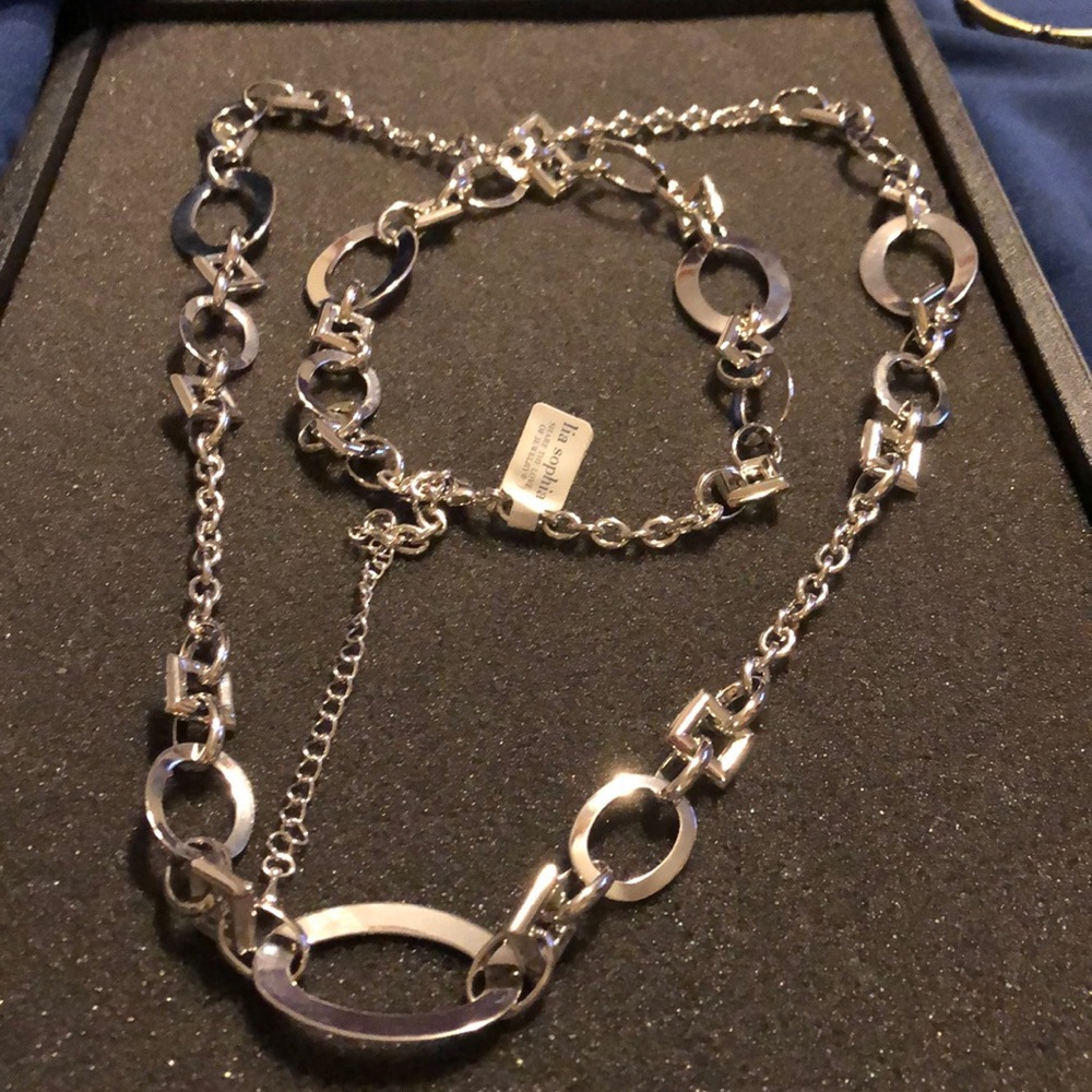 Silver necklace.